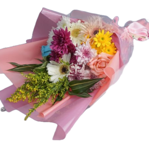 Colourful Mother's Day bouquet presenting a sweet mix of pink, yellow, white, and orange smaller flowers and greenery, wrapped in soft pink paper.