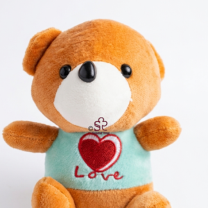 Sherpa Peach Teddy Bear wearing Pink Ribbed Sweater with Gold Heart